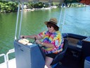 Marcia driving the boat