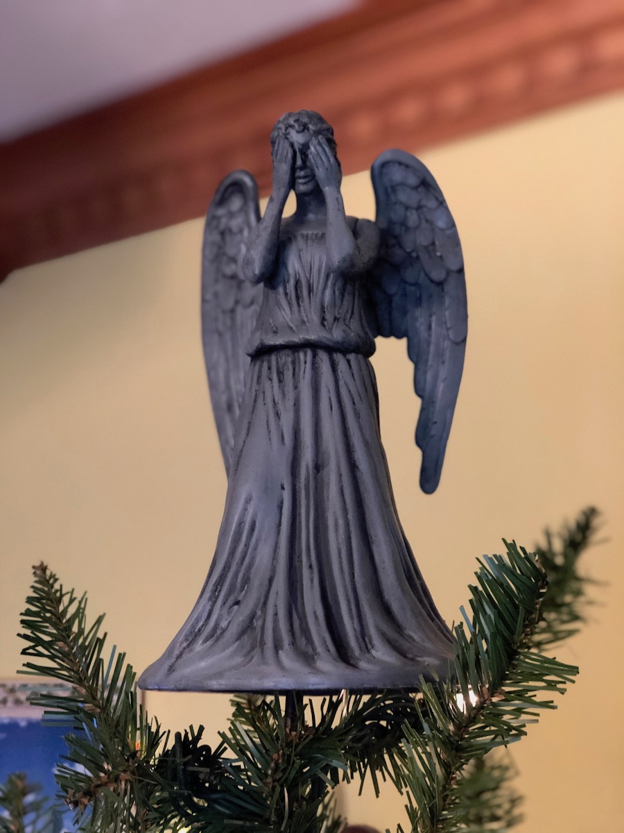 Don't Blink (a Doctor Who reference) - the tree topper this year is a Weeping Angel.
