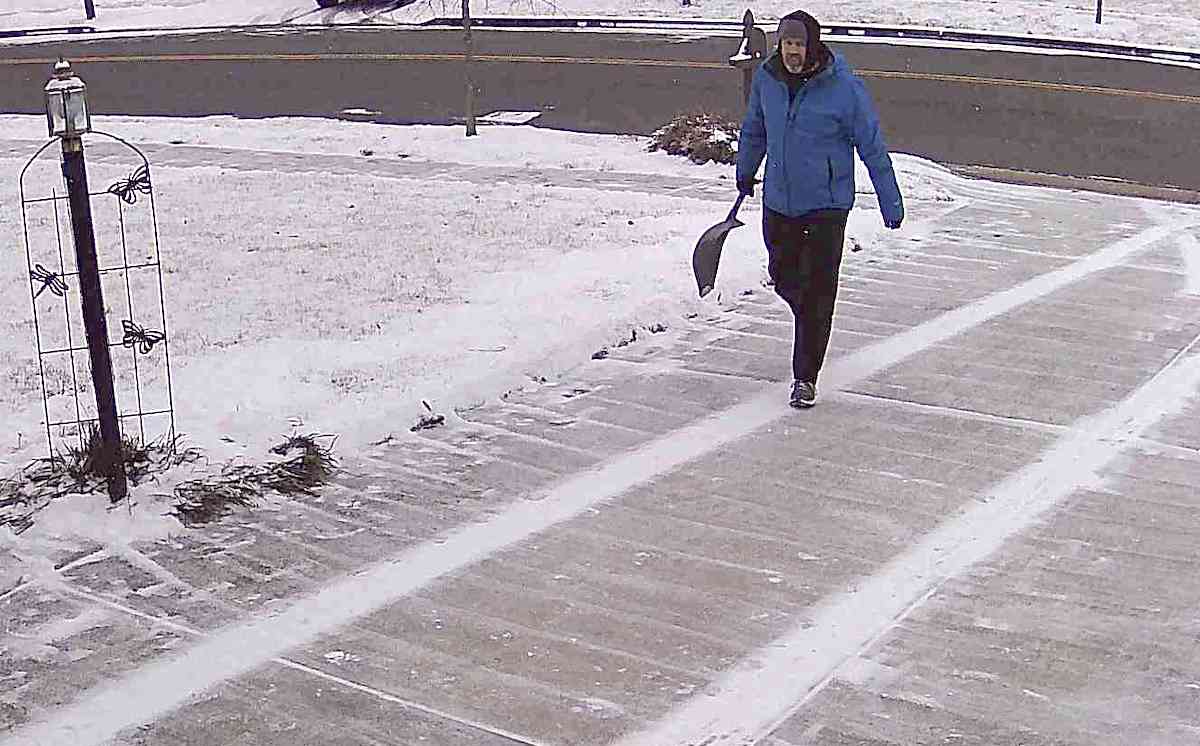 Me heading back into the house after shoveling snow from driveway and sidewalks