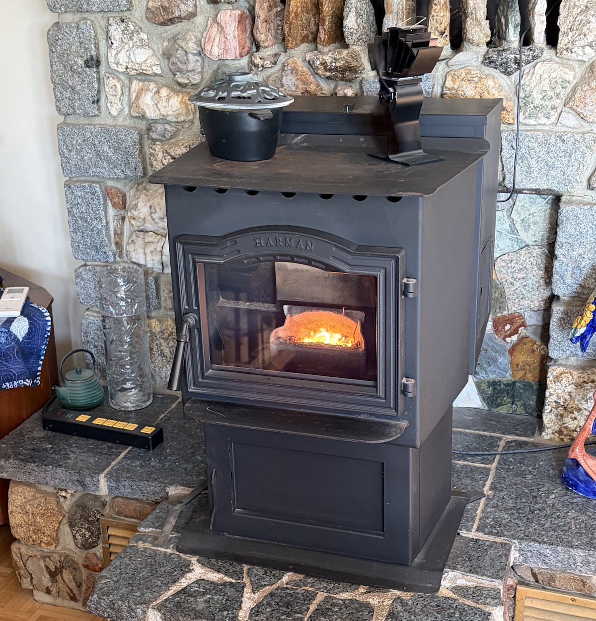 Harman pellet stove, fire burning in the throat of the stove