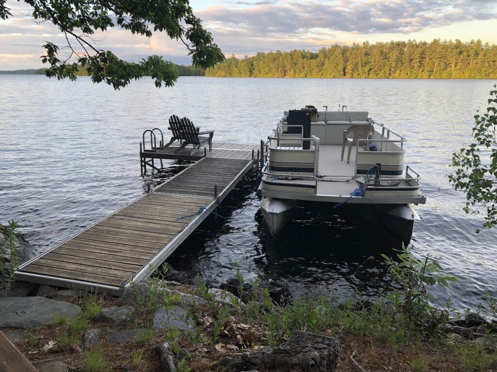 The view of the lake from the door of the camp, in the middle of Maine.