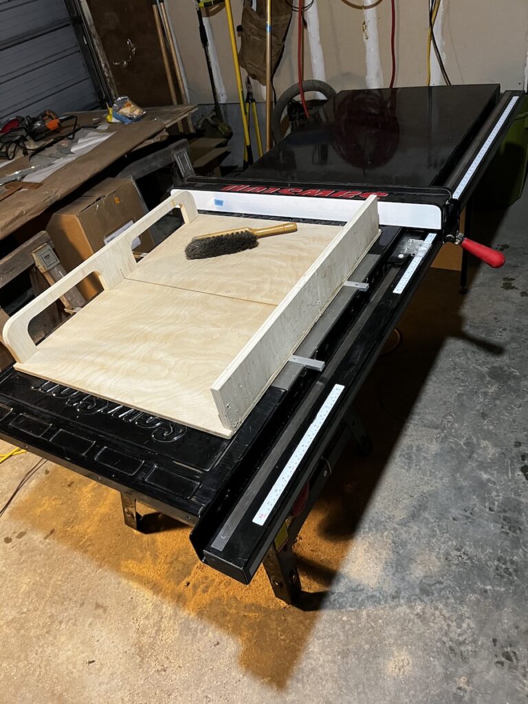 SawStop contractor table saw with extension table, and home-built cross-cut sled.