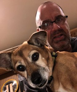 Lexi: The thunder always wins, so she sits in my lap and shivers..